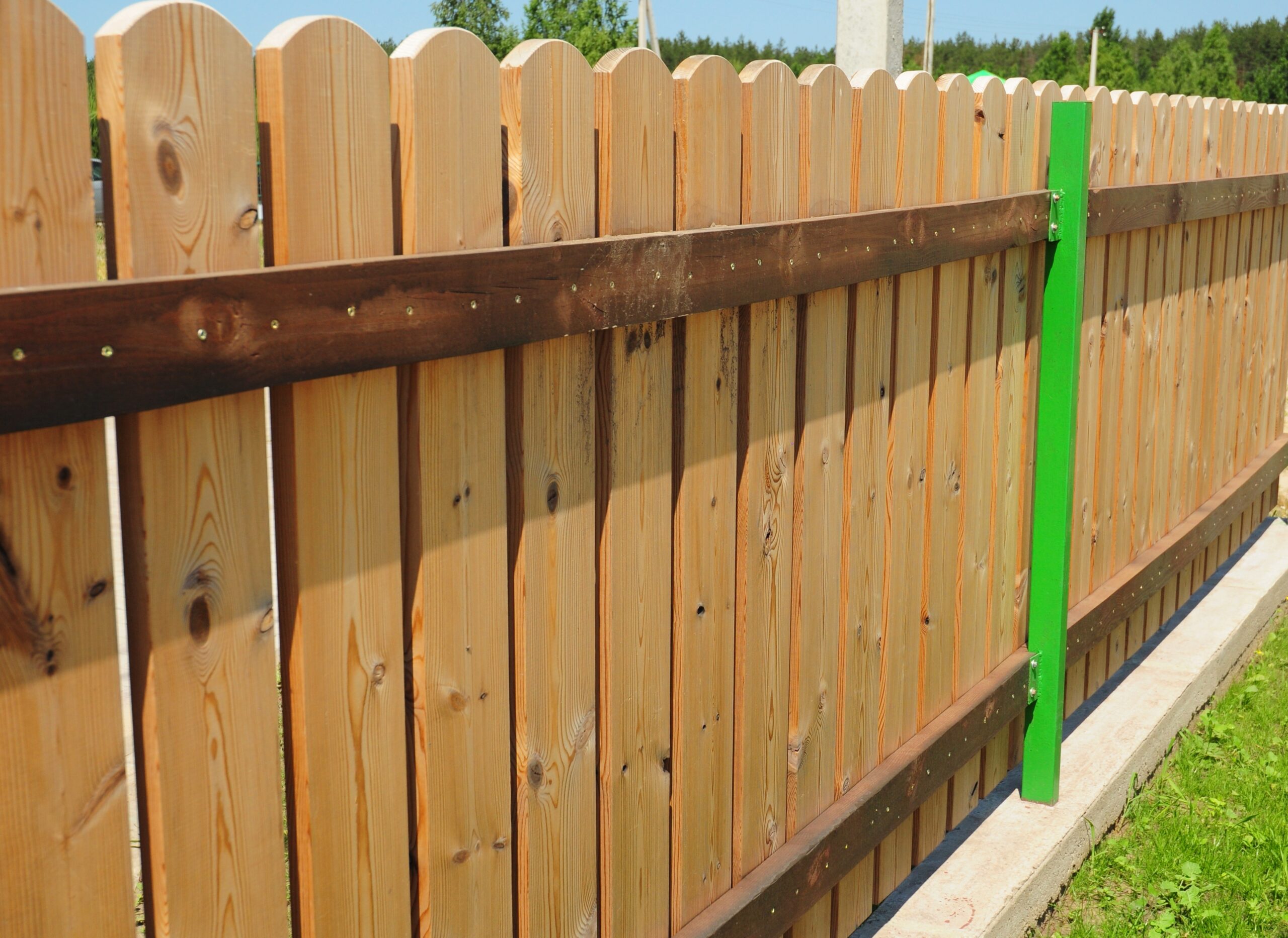 A close up image of a residential wooden fence.